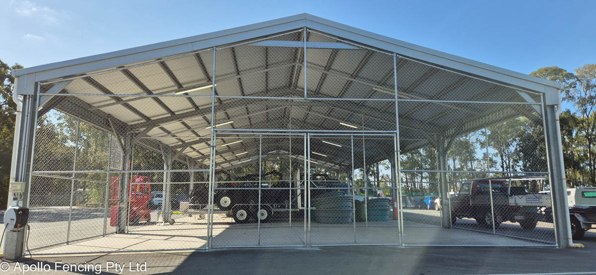 Chain mesh fencing used to create a security enclosure from a machinery shed on the Gold Coast - installed by Apollo Fencing