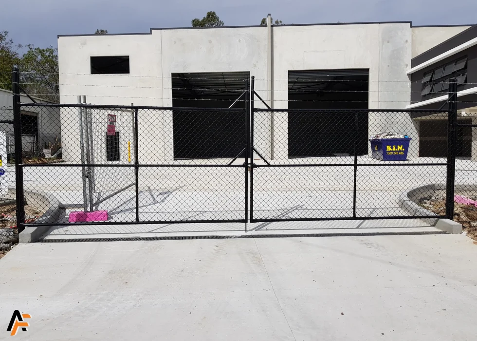 double black security gates installed in brisbane by apollo fencing