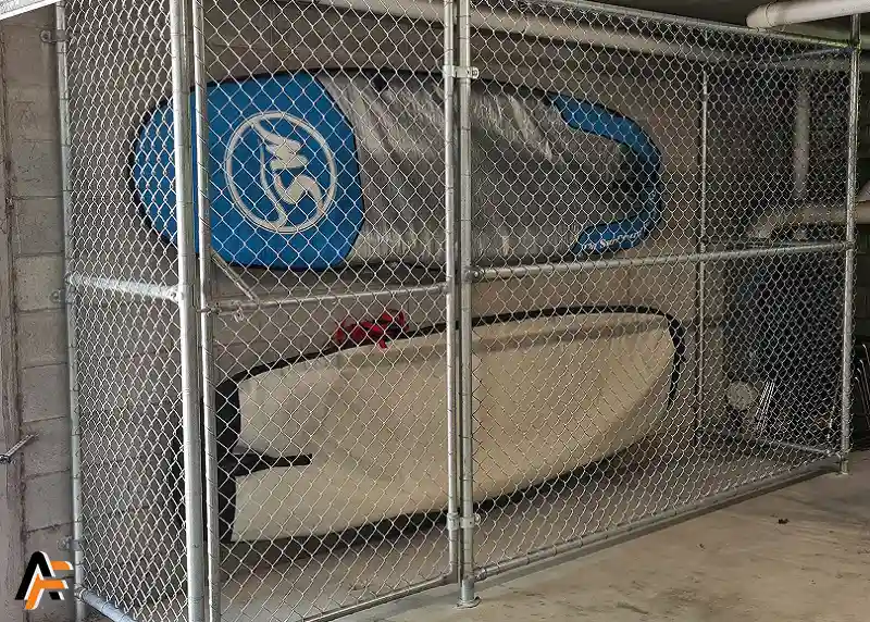 Storage cage made from chain link installed on the gold coast to store surf boards