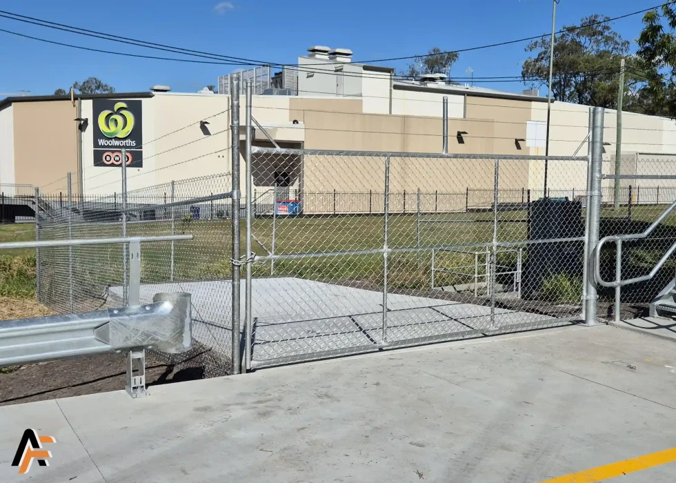 commercial security cage installed on the gold coast with barbed wire to enclose a pumping facility yet to be installed