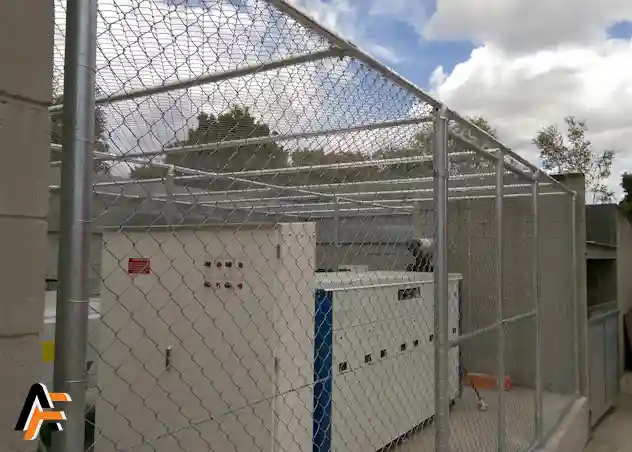 commercial security cage installed with chain link roof to enclose equipment on the gold coast