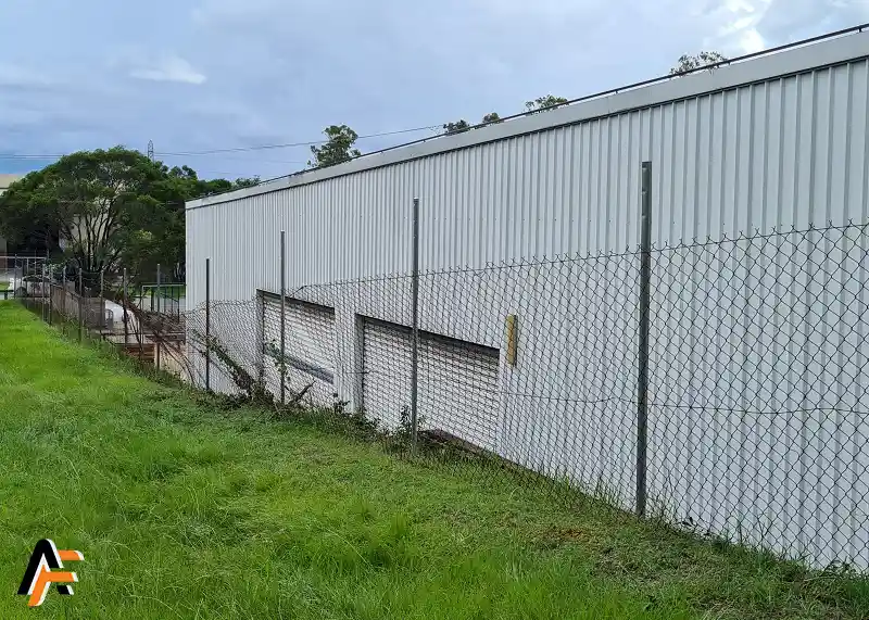 Commercial chain wire fencing before repairs